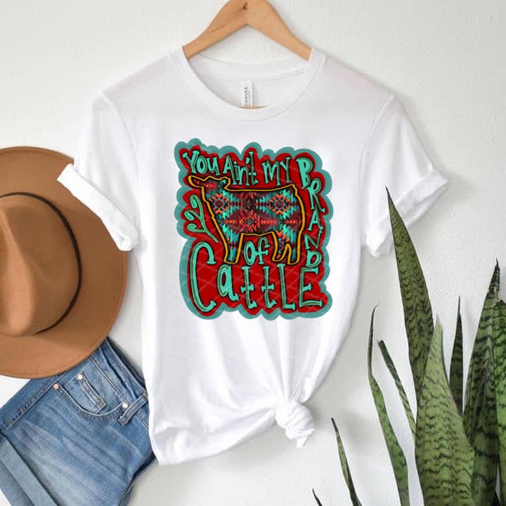 You Ain't My Brand Of Cattle - Azteca con estampado de topacios y turquesas para venta al por mayor de Blonde-Tee's