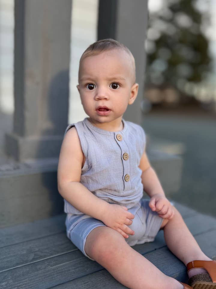 Sleeveless organic gender neutral muslin romper in Cloud for wholesale by Mimi & Me