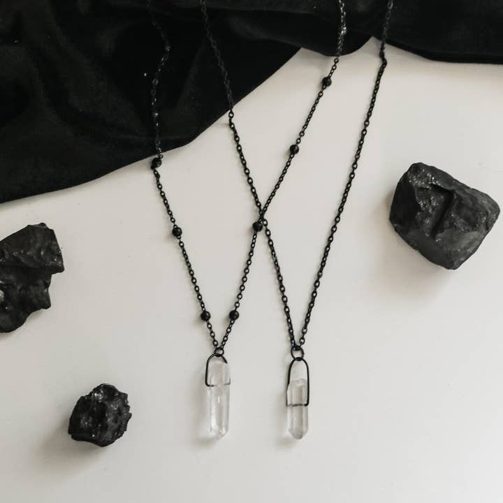 Black or Silver Clear Crystal Quartz Point Necklace for wholesale by Cosmic Crow