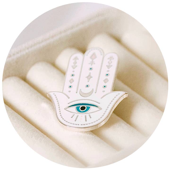 HAMSA ENAMEL PIN, WHITE & SILVER for wholesale by CLEOMAGICK
