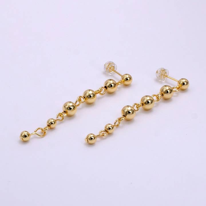 Orecchini a perno pendenti minimalisti con bolle e perline rotonde da 60 mm in oro riempito 14K | AB1102 per la vendita all'ingrosso da parte di Aim Eternal