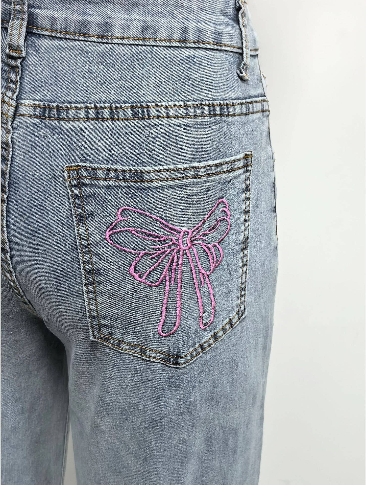 Blue Women High-Waisted Wide-Leg Jeans with Pink Bow Embroidery for wholesale on Faire4