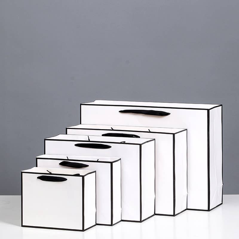 ByHome - Venta al por mayor Bolsas de celofán - Bolsa de regalo blanca con borde negro y papel de seda gratis6