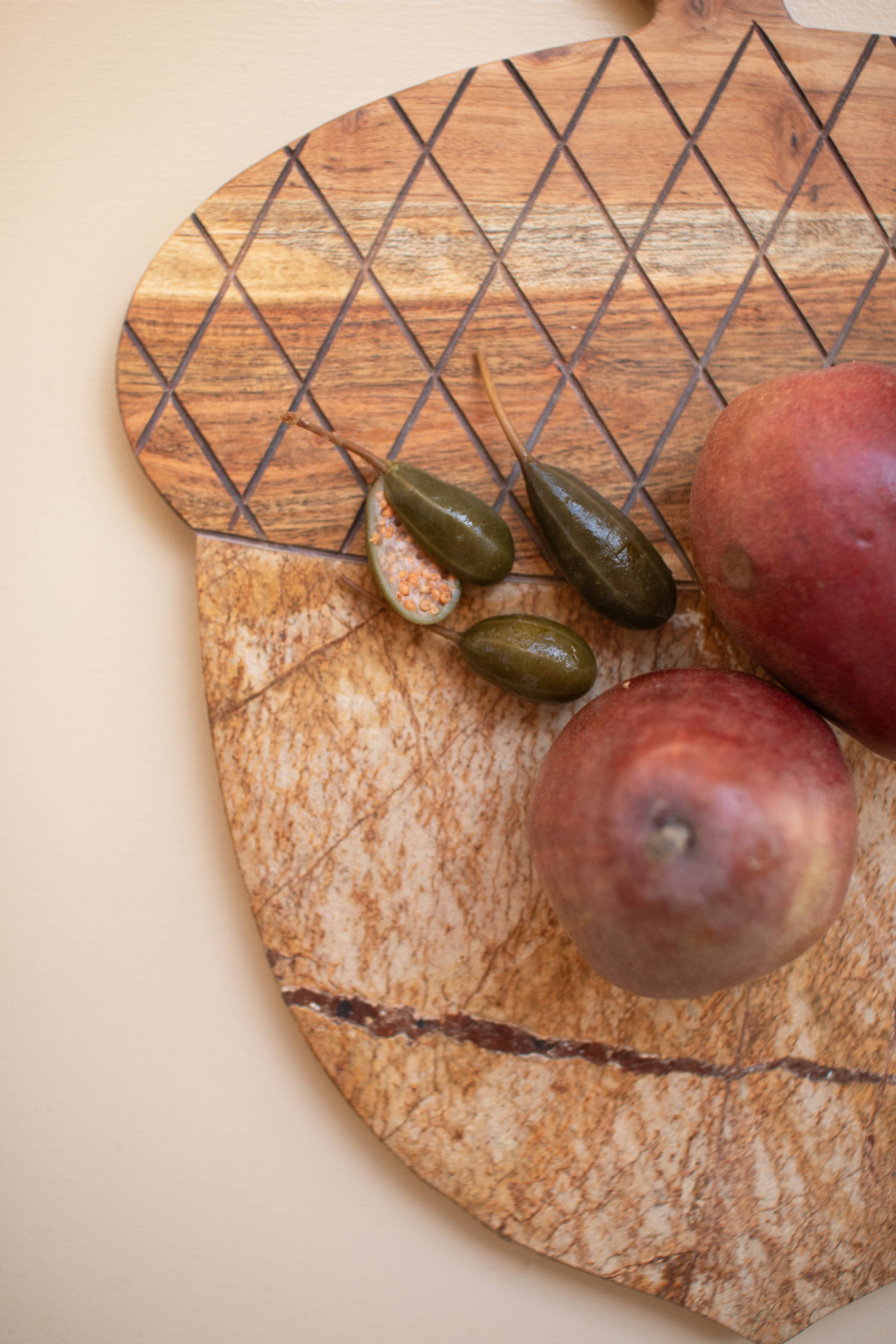 Brown ACACIA WOOD AND MARBLE ACORN SERVING BOARD for wholesale on Faire3