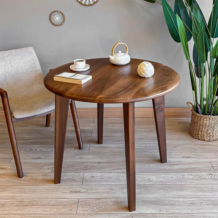Petra Round Wood Dining Room Table | Walnut Wood Mid Century Design for wholesale by Tomruque