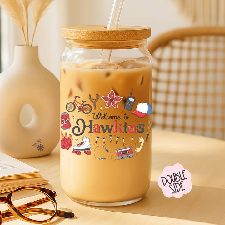 Welcome to Hawkins 16 OZ Glass Can With Lid and Straw for wholesale by Book Lover Merch Shop