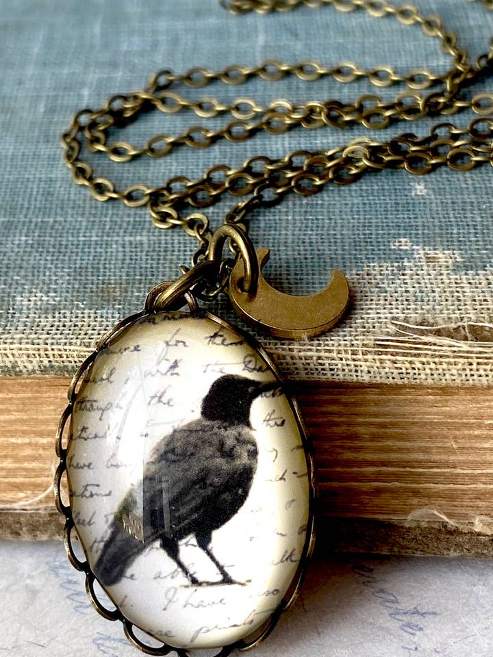 Black Crow Cameo Necklace Mystical Raven Moon Spooky Bird for wholesale by Red Truck Designs