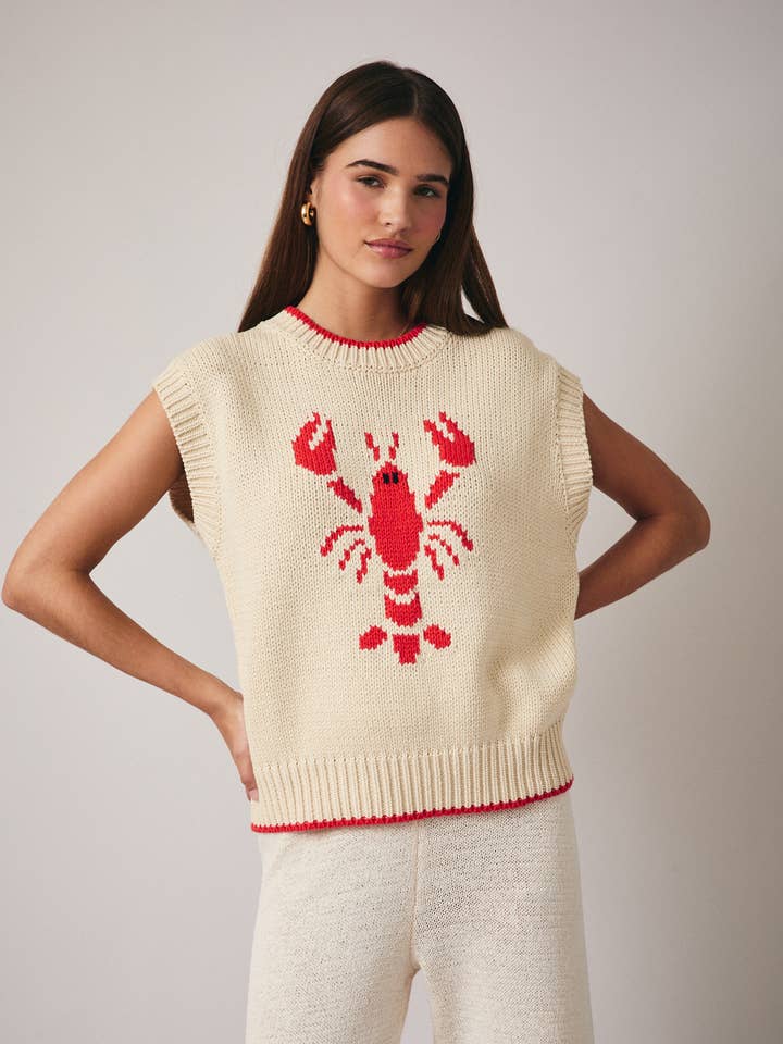 CREAM RED WIDE HIGH NECK SLEEVELESS "LOBSTER" SWEATER for wholesale on Faire0