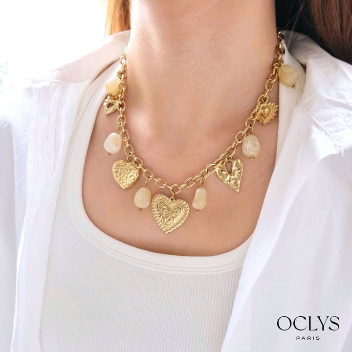 Halskette mit Herzanhängern aus vergoldetem Edelstahlharz Kela für den Großhandel von Oclys