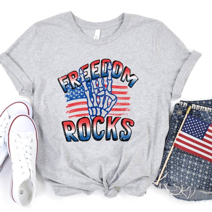 Freedom Rocks 4th Of July T-Shirt for wholesale by Hello Gorgeous Apparel