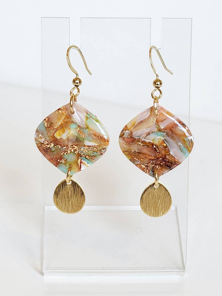 Terracotta Terra e Cielo per la vendita all'ingrosso da parte di Marbled Maven