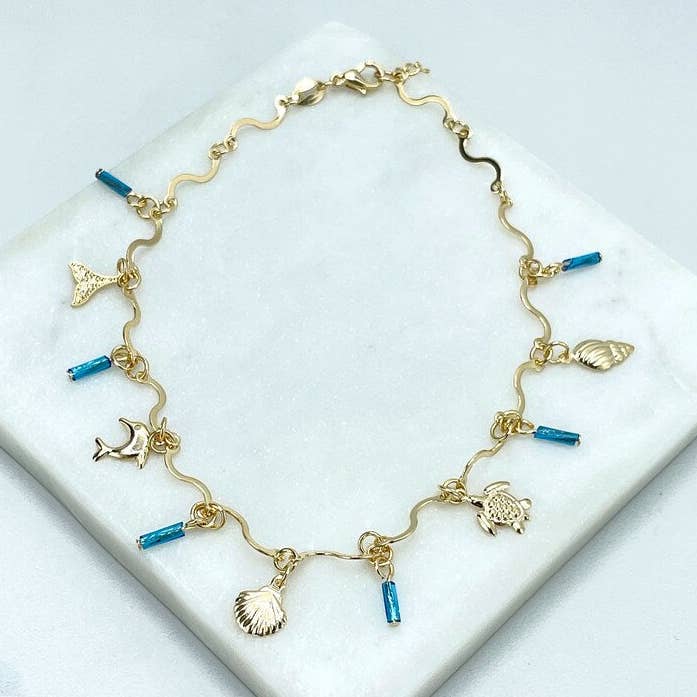 18 kt. guldfyldt specialkæde, blå rørformede perler, skal, skildpadder, delfin, gråhale-dingle charms forbundet ankelkæde for engroshandel hos Luxus Accessories