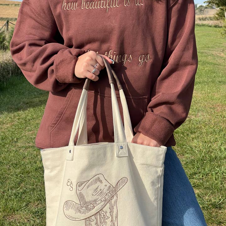 Cowboy Boots Leather & Canvas Tote Bag and other Purchase Wholesale canvas and leather bags. Free Returns & Net 60 Terms on Faire trending on Faire.