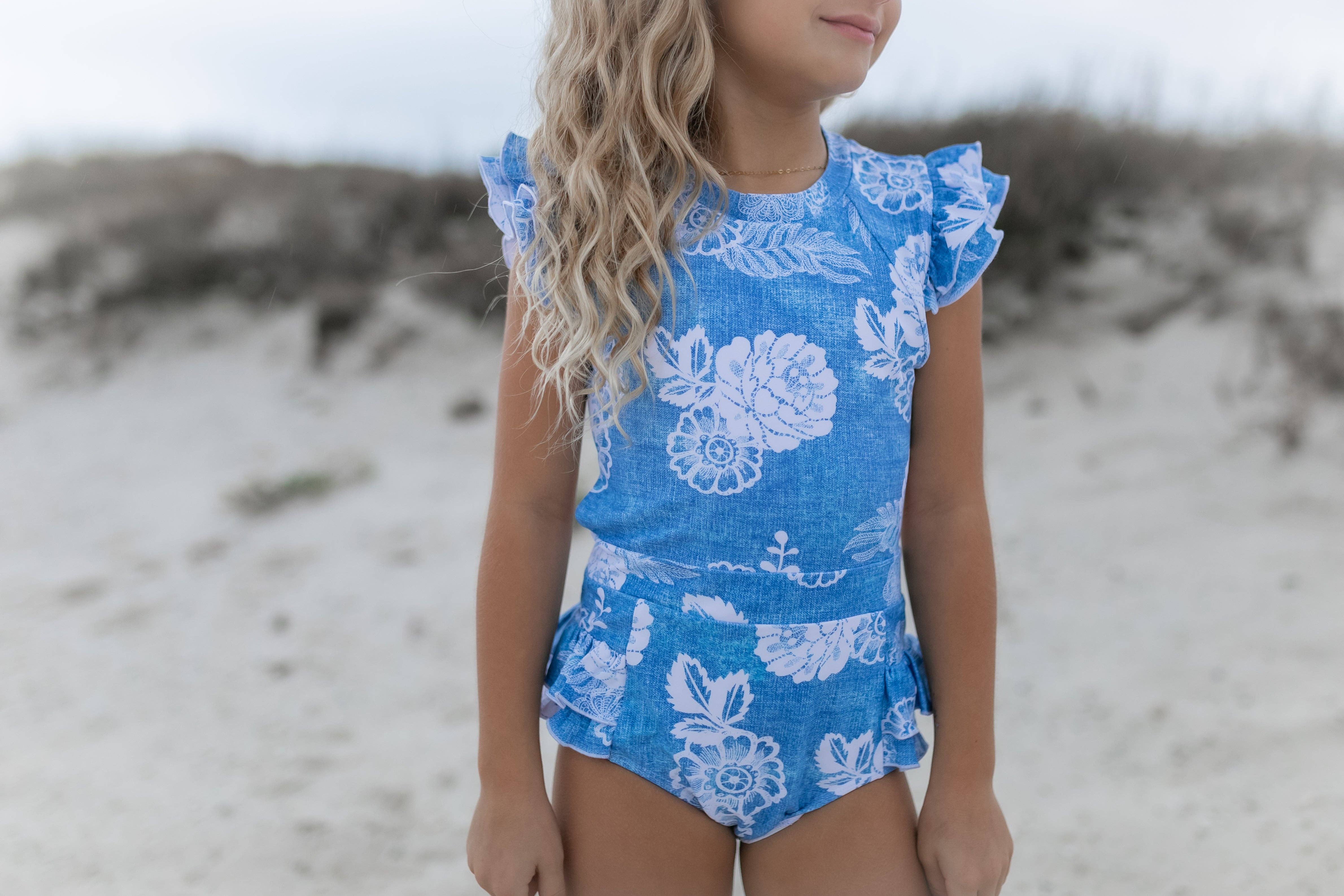Oopsie Daisy - Wholesale One Piece Swimsuit - Kids - Kids Blue Floral Open Back One Piece Ruffle Swimsuit1