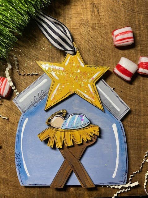 Baby Jesus in manger Christmas ornament for wholesale by Pink Fish Studios, LLC.