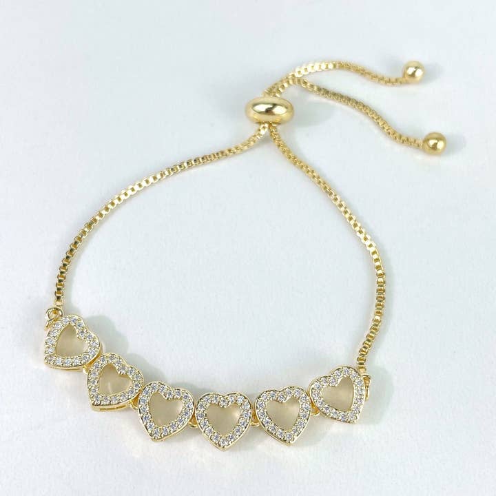 Bracelet ajustable à breloques cœurs remplis d'or 18 carats pour la vente par Luxus Accessories