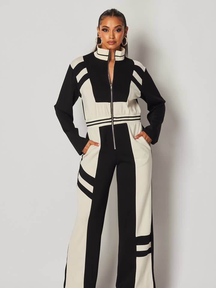 Black Just Fine Stripe Color Block Track Jumpsuit (HDR32861) for wholesale on Faire