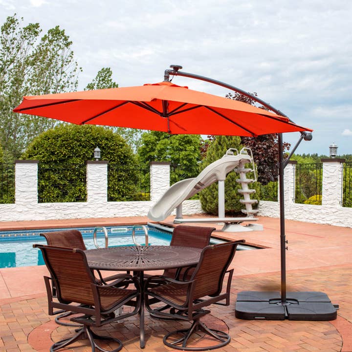 10 ft Solar Offset Patio Umbrella with Crank - Burnt Orange for wholesale by Sunnydaze Decor