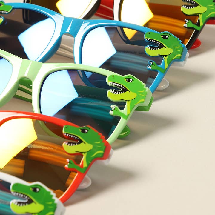 12 OLIKA FÄRGER Barndinosauriemönster tecknade solglasögon för wholesale på Faire