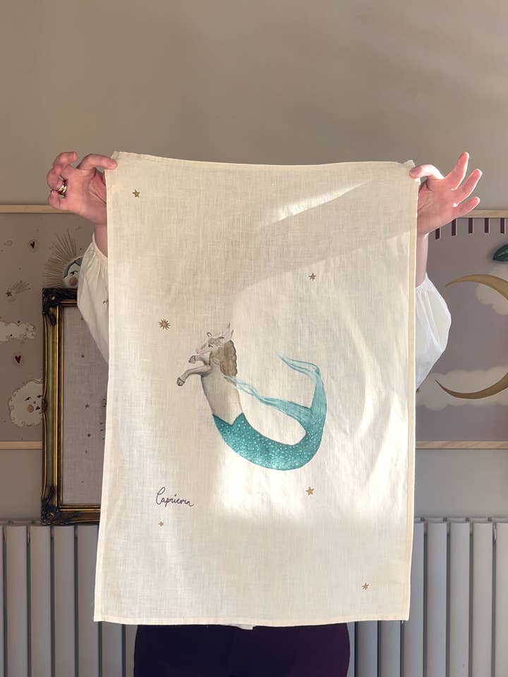 Linen Tea Towel "Capricorn" for wholesale by Queen of the Rodeo