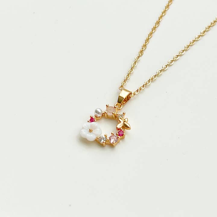 Ninaouity - Venta al por mayor Collares con colgantes/abalorios - Collar de corona de flores doradas - con cristal rosa y perla1