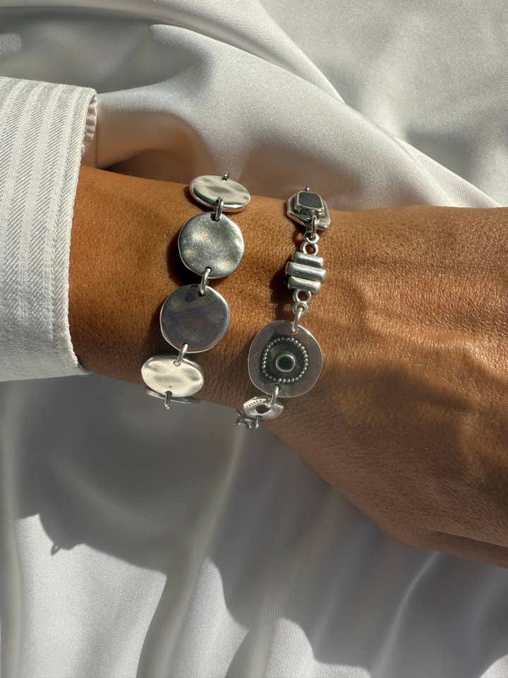 Handmade Silver Bracelet Set – Hammered Disc & Charm Designs for wholesale by Christina Christi