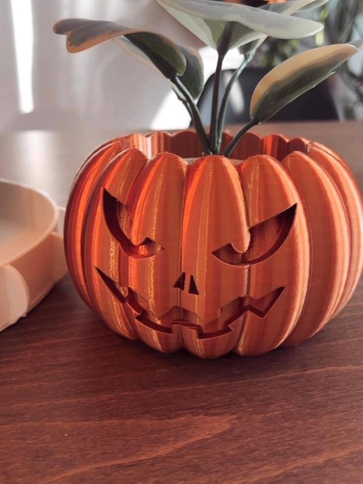 The Jack-O-Plantern | Pumpkin Plant Pot for wholesale by Prairie City Printing Co.