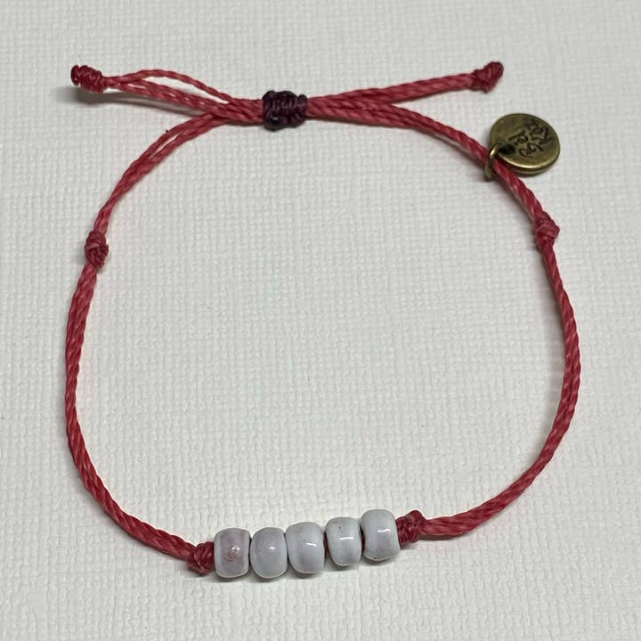 BRANCO | Pulseira ajustável de cordão encerado ROSA EMPOEIRADO por atacado de Bel Koz Haiti