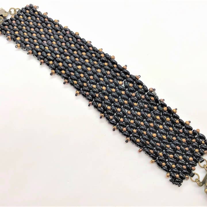 Black and Bronze X&O Hand Sewn Bracelet for wholesale by EMMIS JEWELRY