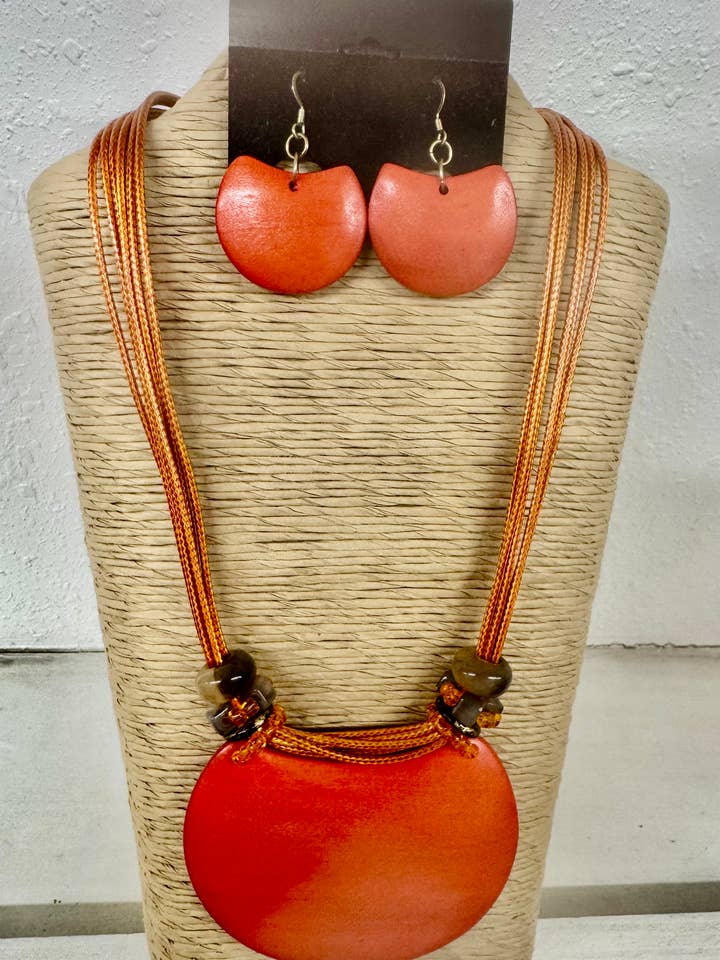 6 STRANDS ORANGE WAX CORD WITH IRREGULAR ORANGE WOOD PENDANT for wholesale by International Duru's