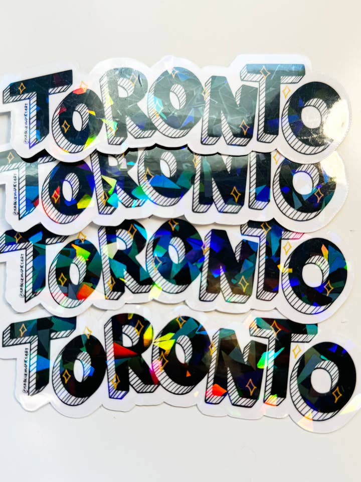 Toronto-klistermärke - Holografisk vinyl för wholesale av Studio Junco