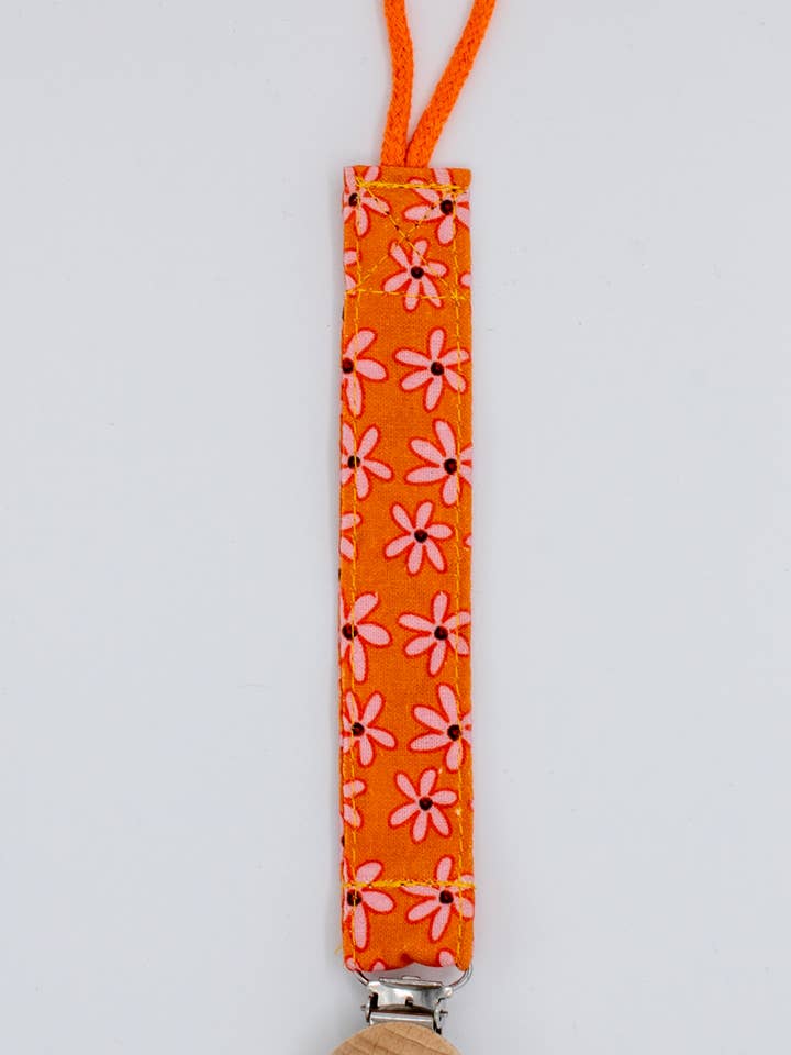 Chupetero flores naranja para venta al por mayor de Colori Ribelle