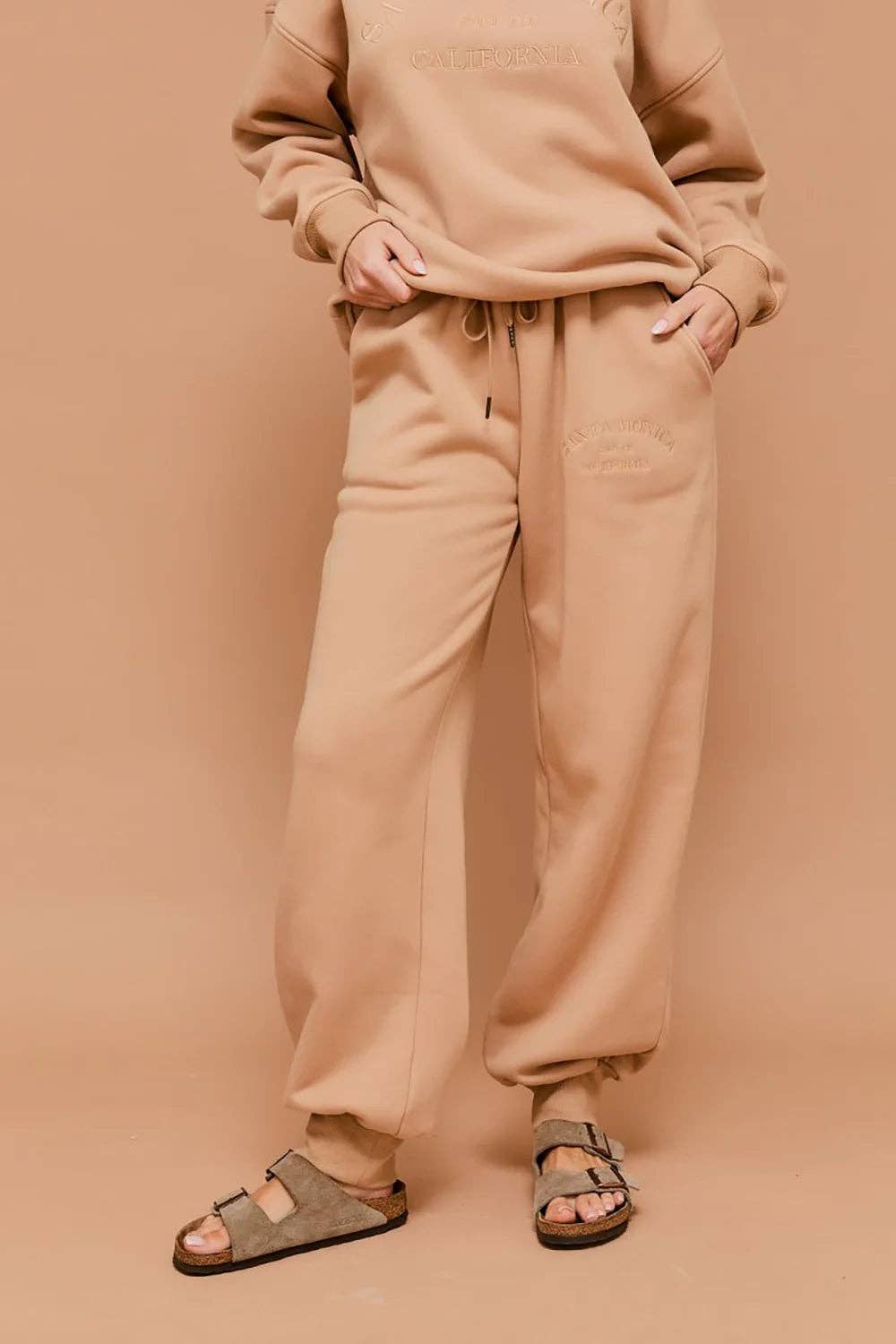 Beige "Santa Monica California" Embossed Graphic Elastic Waist Drawstring Joggers for wholesale on Faire0