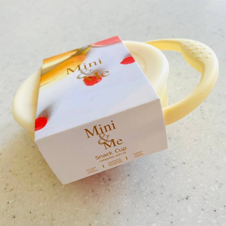 Mini & Me Snack Cup Collapsible with Lid Custard for wholesale by Cuddle Bug & Co