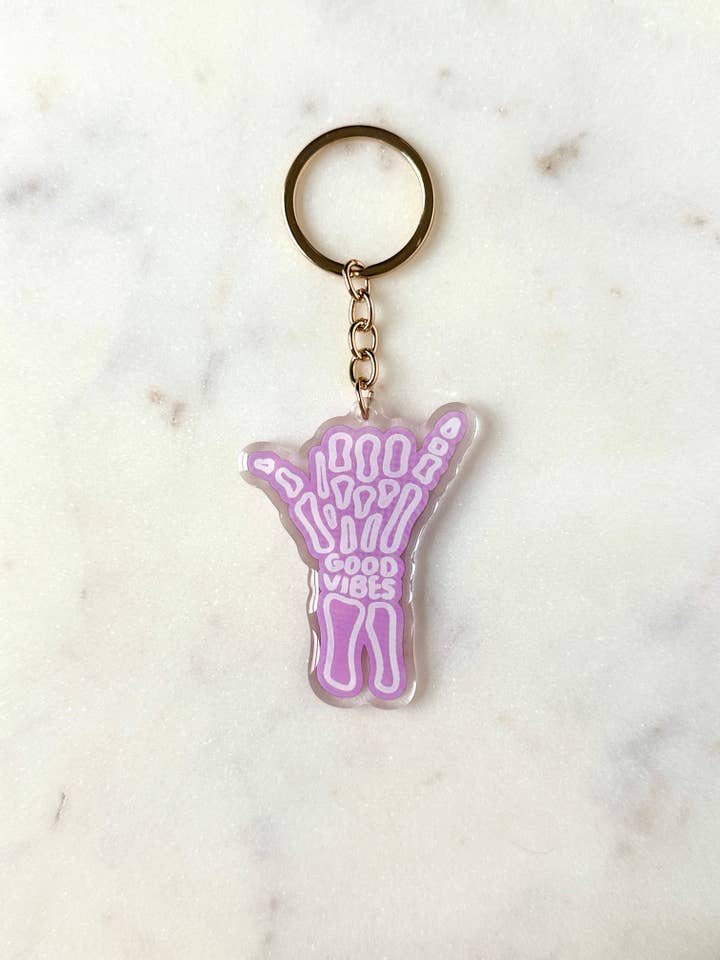 Good Vibes Skeleton Acrylic Keychain for wholesale by liadelyonart