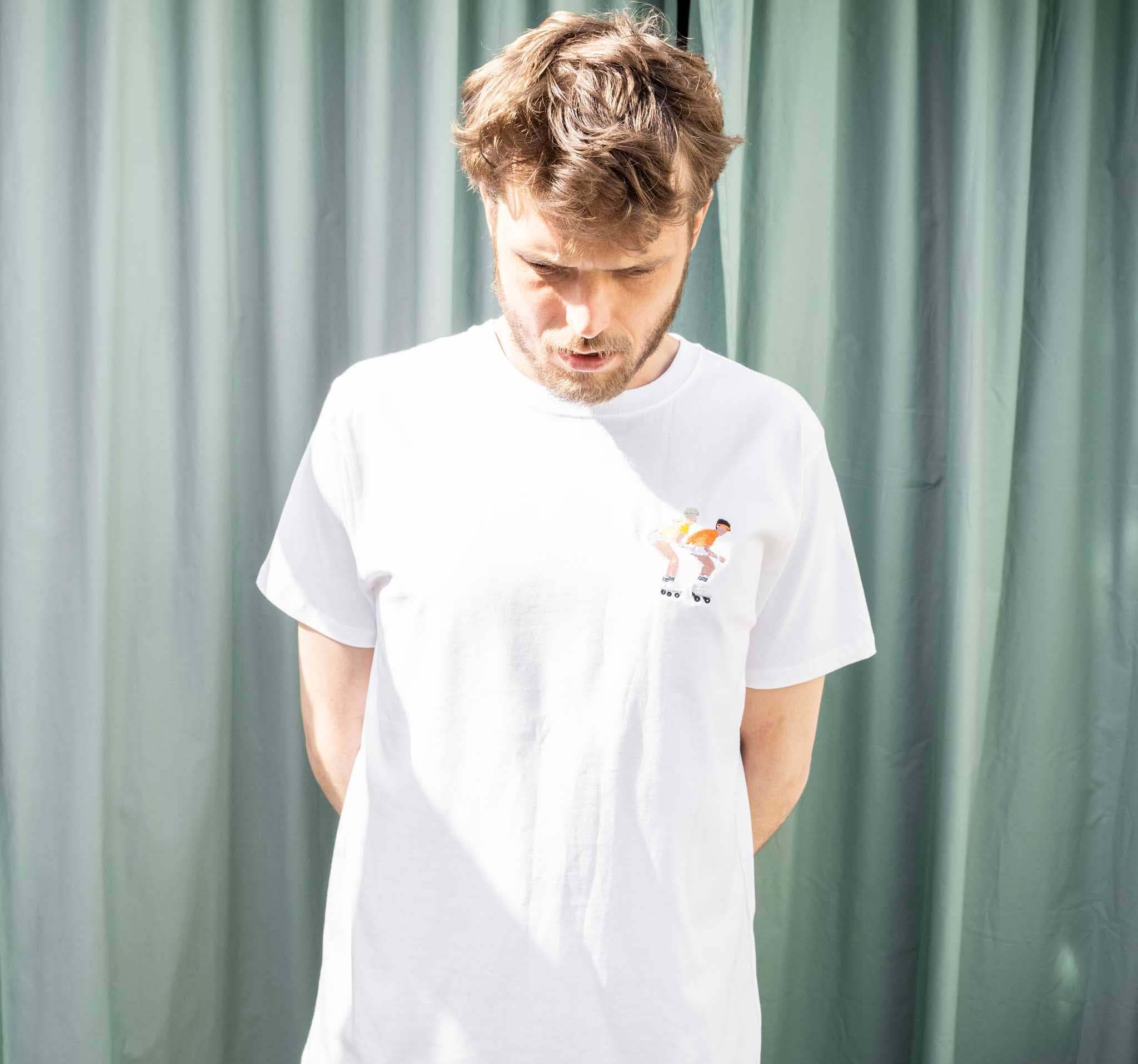 white Roller skating boys | t-shirt for wholesale on Faire3