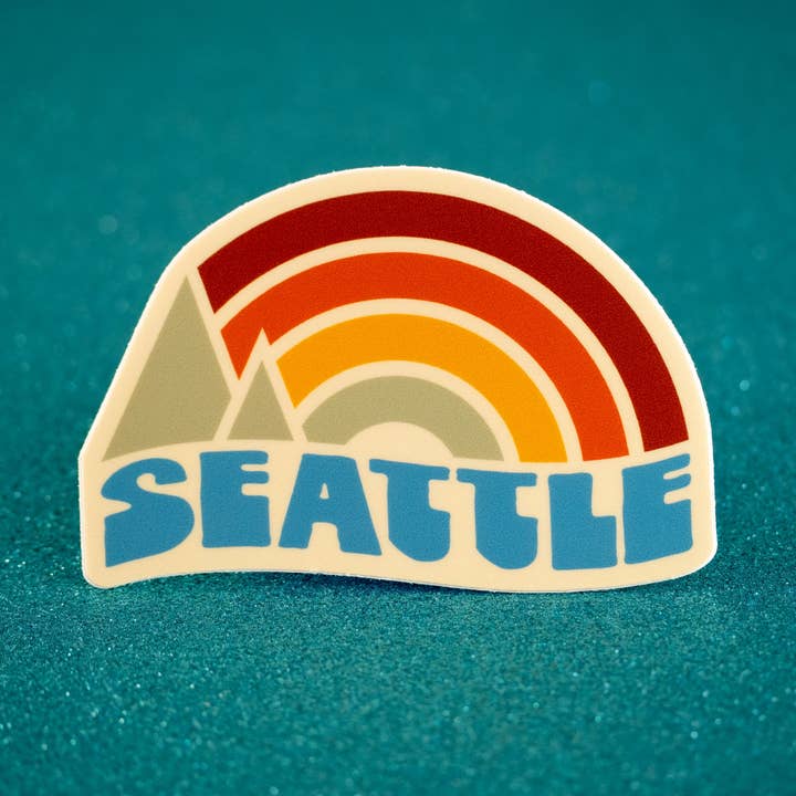 Seattle, Washington - Vinyl Sticker - Rainbow Sunset for wholesale by Little Hiker Bird