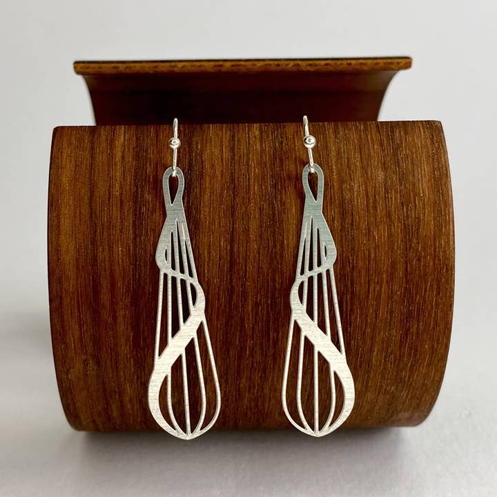 Calla Lily Silver Dangle Earrings and other Purchase Wholesale calla lily bulbs. Free Returns & Net 60 Terms on Faire trending on Faire.