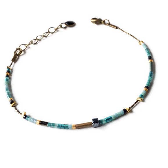 Ultra-fine, delicate, minimalist bracelet/j glass beads for wholesale by Atelier Vivienne