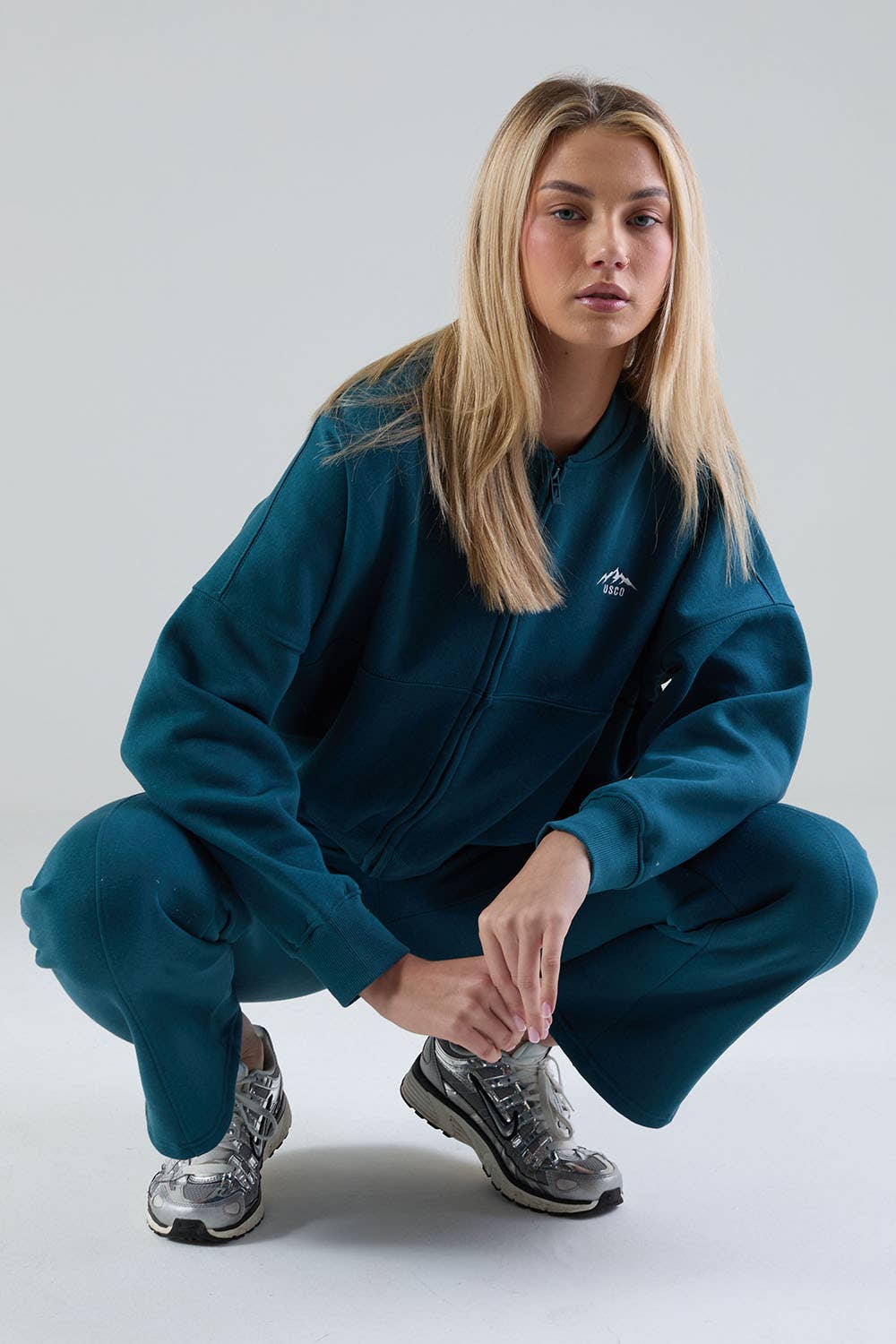 The Apex Tracksuit in Teal for wholesale on Faire6