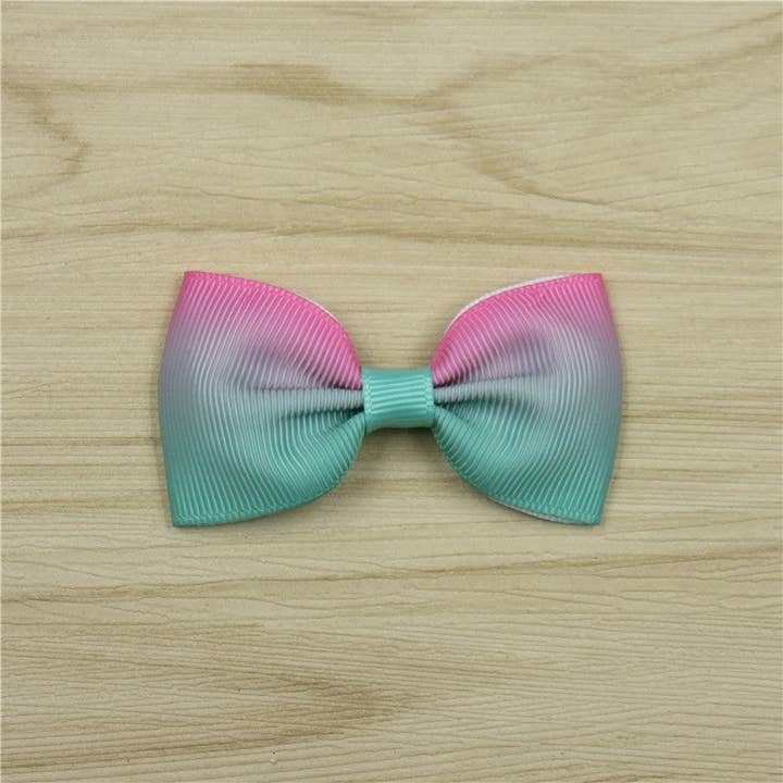 Gradient Bow Hair Clip and other Purchase wholesale trendy accessories. Free returns & net 60 terms on Faire trending on Faire.