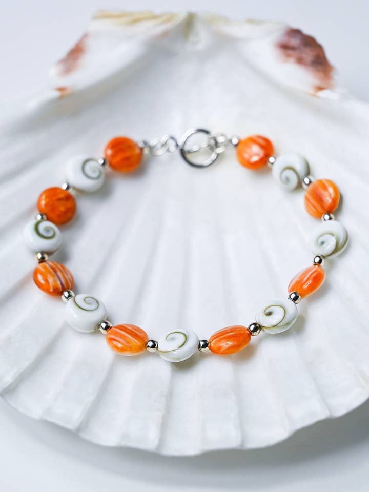 Spiny Oyster Shell Coin & Shiva Eye Shell Bracelet for Women for wholesale by Jasmine Sol Jewelry