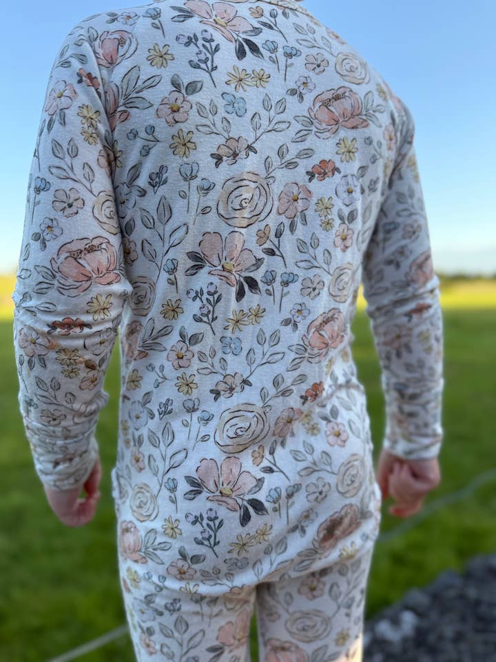 Pastel Petals Modal Zippy Romper for wholesale by Little Joy Co.