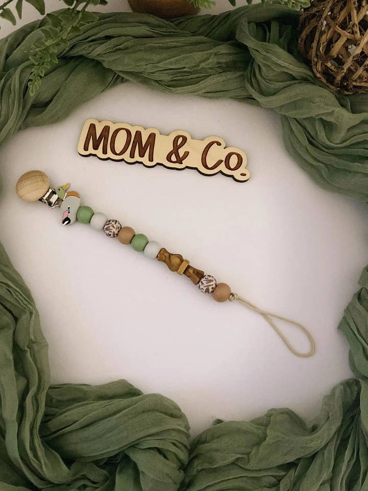 Mallard Duck Call Pacifier Clip for wholesale by Mom & Co.