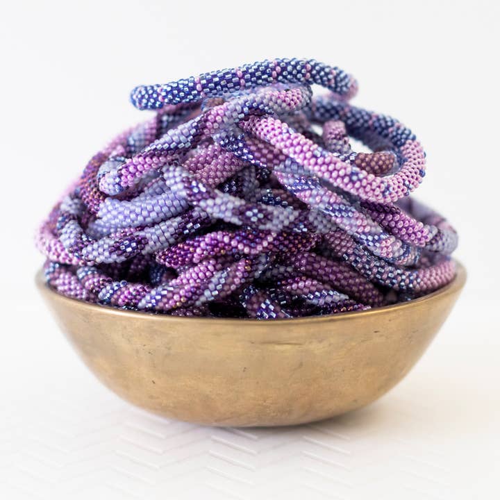 Aid Through Trade - Wholesale Jewelry Set - The Original Roll-On® Bracelet Amethyst - Set of 12