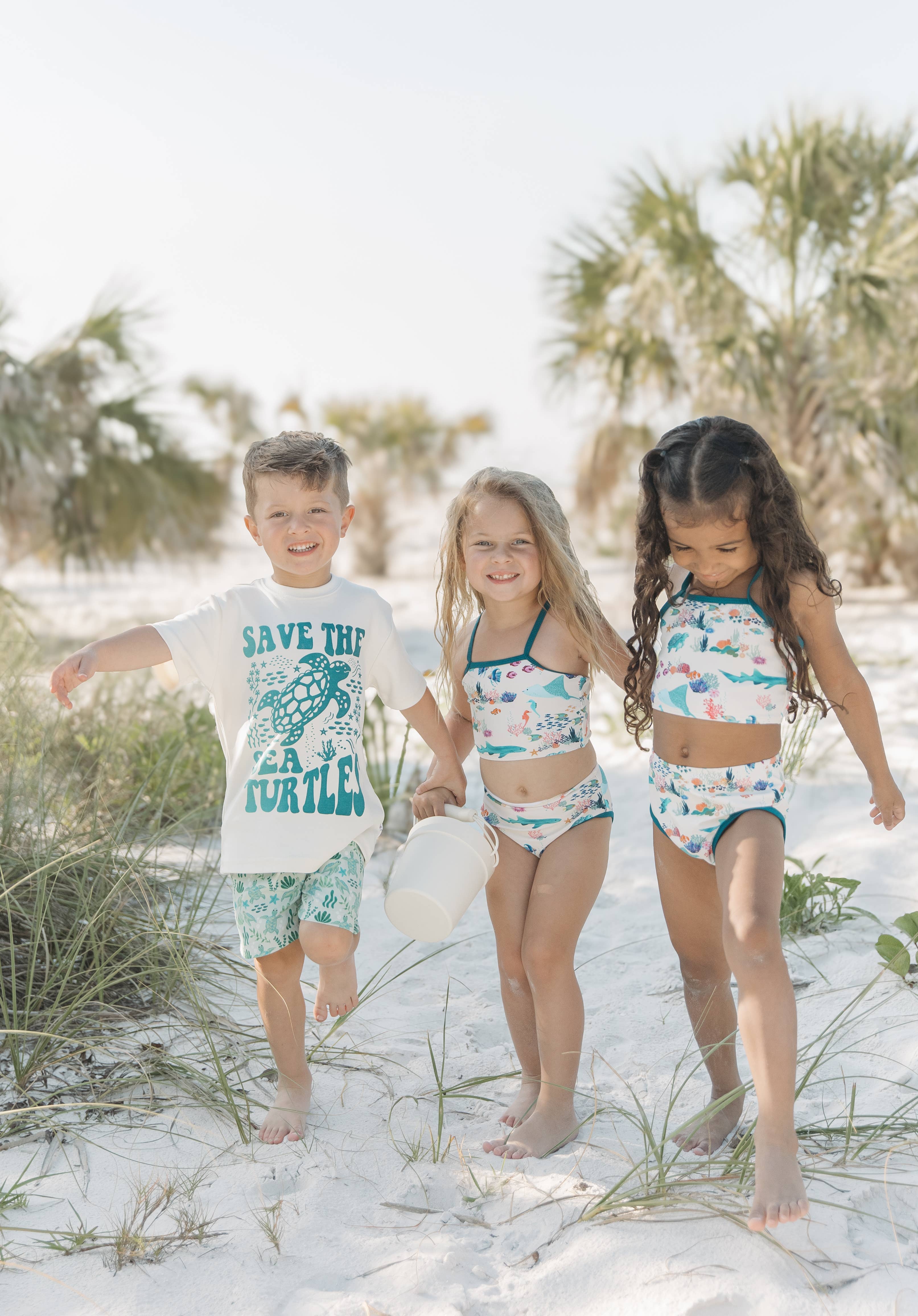 Green Save the Sea Turtles Boys Swim Trunks for wholesale on Faire6