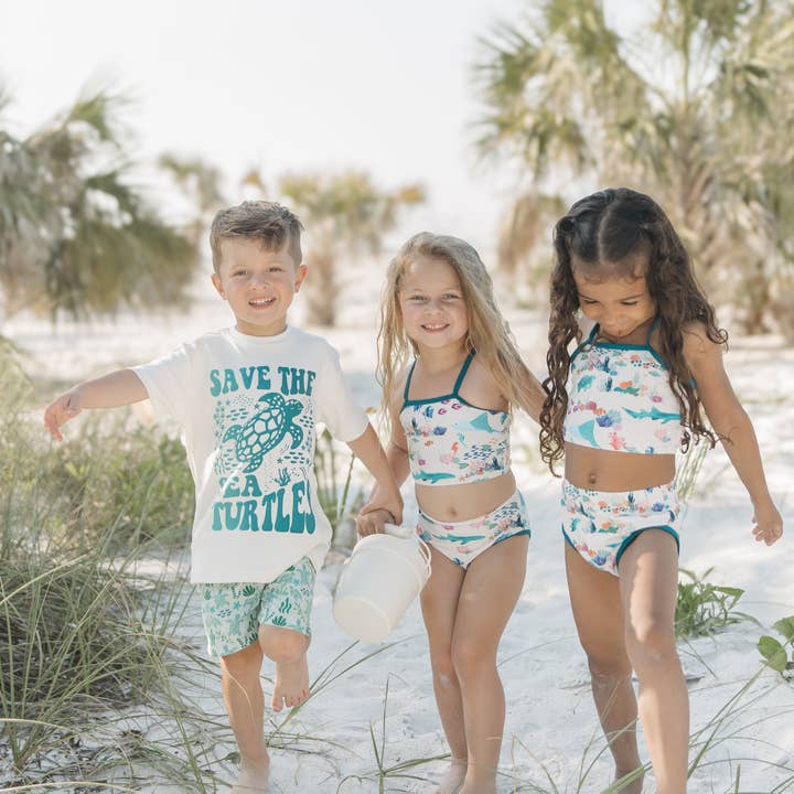 Green Save the Sea Turtles Boys Swim Trunks for wholesale on Faire6