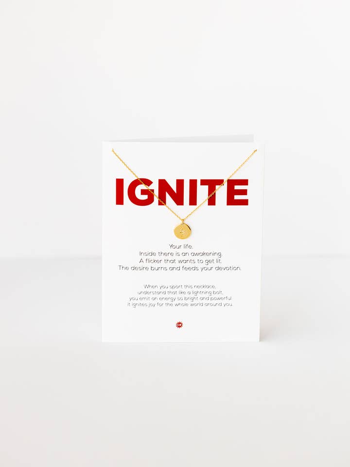 IGNITE | Gold necklace with CZ lightning bolt coin for wholesale by CHEEKYBOOM