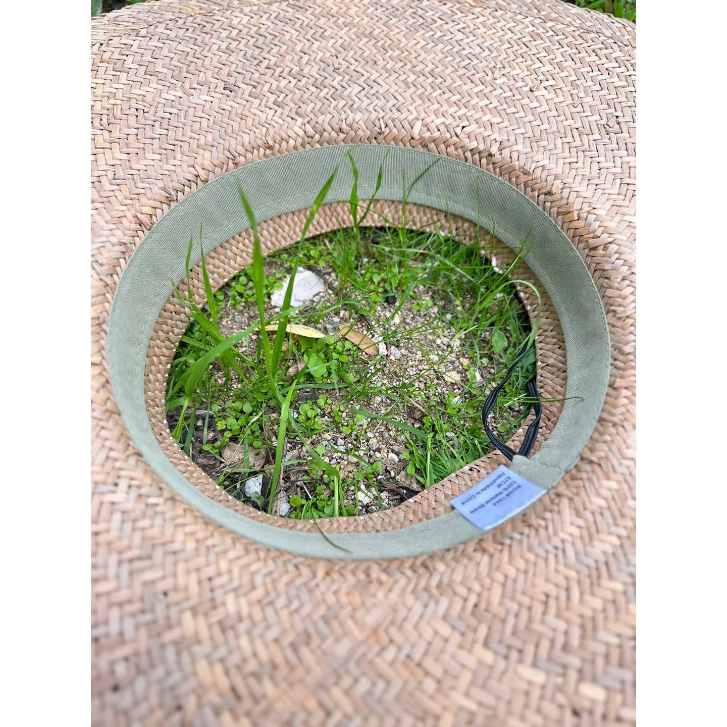 HANDWOVEN NATURAL STRAW CROWNLESS HAT for wholesale on Faire8