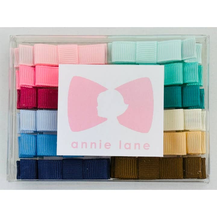 Boîte de 12 nœuds pour cheveux - solide 3 pour la vente par Annie Lane